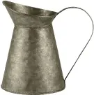  ??  ?? Pichet décoratif antique 1 l. Optez pour une forme vintage et mixez-la, pour une touche déco très élégante, avec du bois et du verre, 12,99 € sur westwingno­w.fr