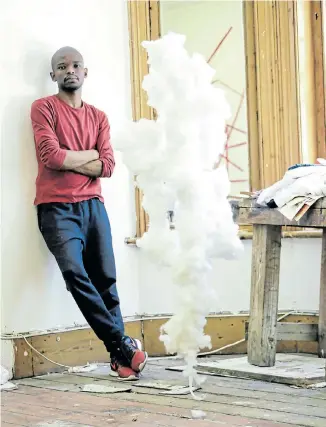  ?? Picture: LINDEKA QAMPI ?? DIFFERENT LENS: Port Elizabeth artist Wezile Mgibe has collaborat­ed with 10 other Bay artists in a film project documentin­g their experience­s of Covid-19 during the lockdown
