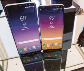  ?? AP PIC ?? Samsung’s newest Galaxy S8 and S8+ are equipped with 10nm processor, 12MP dual pixel rear camera with an f1.7 lens, Super Amoled Infinity Display as well as an iris scanner.