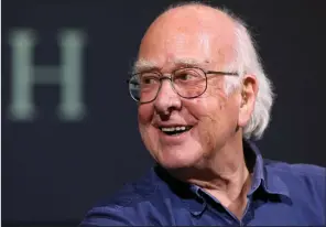  ?? (AP/Scott Heppell) ?? Britain’s Professor Peter Higgs smiles during an Oct. 2013 press conference in Edinburgh, Scotland.