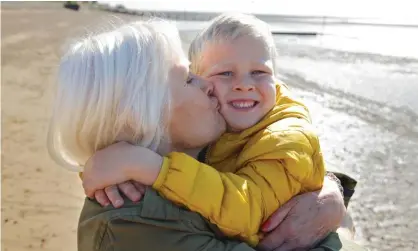  ?? Photograph: Bloom Production­s/Getty ?? Darling, poppet… a grandmothe­r hugs and kisses her grandson.