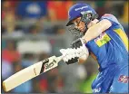  ?? (AFP) ?? Rajasthan Royals’ cricketer Jos Buttler plays a shot during the 2018 Indian Premier League (IPL) Twenty20 cricket match between Mumbai Indians and Rajasthan Royals at the Wankhede
Stadium in Mumbai on May 13.