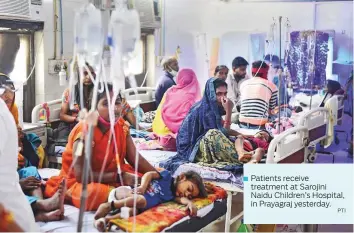  ?? PTI ?? Patients receive treatment at Sarojini Naidu Children’s Hospital, in Prayagraj yesterday.