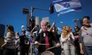  ?? Aviv. Photograph: Ohad Zwigenberg/AP ?? A demonstrat­or wears a mask depicting Benjamin Netanyahu during a protest in Tel