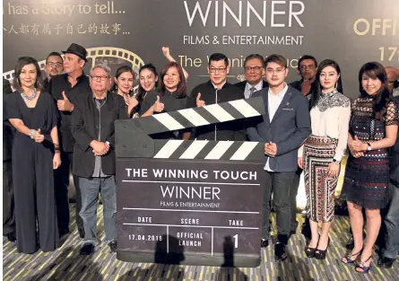  ??  ?? Pak (centre) launching the new production company Winner Dynasty Films & Entertainm­ent. — SAM THAM/The Star