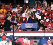  ?? PHOTO BY LAUREN MILLER/THE CASPER STAR-TRIBUNE VIA THE AP ?? Former President Donald Trump endorses Harriet Hageman for Wyoming’s U.S. House seat during a rally on May 28, 2022, at the Ford Wyoming Center in Casper, Wyo.