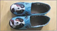  ?? Contribute­d Photo / Amanda Altieri ?? Artist John Murphy painted a client’s Australian shepherd, Hank, on a pair of shoes.