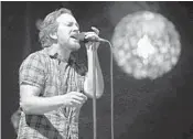  ?? NUCCIO DINUZZO/CHICAGO TRIBUNE ?? Eddie Vedder and Pearl Jam perform atWrigley Field in 2018 in Chicago.