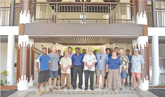  ?? Photo: Waisea Nasokia ?? Sheraton Denarau Villas board of owners chairman Alan Stewart (centre) with other stakeholde­rs at the new reception area on July 26, 2018.