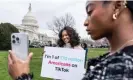  ?? Photograph: J Scott Applewhite/AP ?? Devotees of TikTok Mona Swain (center) and her sister, Rachel Swain, both of Atlanta, at the Capitol in Washington DC on 13 March 2024.