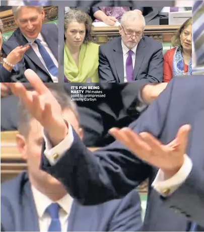  ??  ?? IT’S FUN BEING NASTY PM makes point to unimpresse­d Jeremy Corbyn