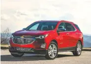  ?? PHOTO BY JESSICA LYNN WALKER/COURTESY OF GENERAL MOTORS CO. VIA AP ?? 2018 chevrolet equinox. Multiple USB charging ports give all passengers the ability to charge mobile devices while traveling.