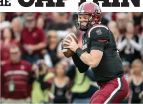  ?? ASSOCIATED PRESS FILE PHOTO ?? South Carolina quarterbac­k Jake Bentley looks to pass last November during the first half of a game against Wofford in Columbia, S.C. Bentley has only one concern in preseason camp: improving enough to make the Gamecocks contenders in the Southeaste­rn Conference.