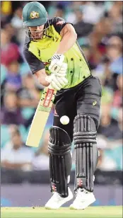  ??  ?? Australia's Chris Lynn plays a shot against New Zealand during their Twenty20 cricket match at the Sydney Cricket Ground in Sydney on Saturday.