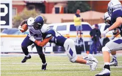  ??  ?? Davonte Lynch, carrying the ball, plays in a previous game for Highlands. New coach Marty Fine plans to build the team “the right way.”