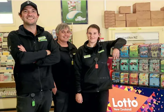  ?? SCOTT HAMMOND/ STUFF ?? Four Square Spring Creek owner Tommy Glubb, with staffers Wendy Moody and Taylor Lewis, right, says to sell a Lotto ticket winning $200,000 is ‘‘pretty incredible’’.