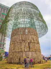  ??  ?? The tree, made from scrap materials, will stand at nearly 100 metres.