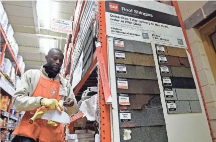  ?? AP FILE PHOTO ?? Home Depot said the average checkout ticket per customer rose 5.5% to $64 during the fourth quarter.