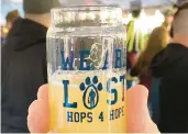  ?? CRAIG LARIMER/THE MORNING CALL ?? Lost Tavern Brewing in Hellertown hosted last weekend’s Hops 4 Hope festival featuring 30 beer makers from Pennsylvan­ia and New Jersey.