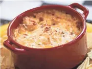  ?? STACY ABLE ?? Loaded Potato Chip Dip is packed with bacon and cheese.