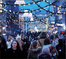  ?? Rick Steves’ Europe ?? Darkness settles on Oslo, Norway, by late afternoon in December, but festive garlands light up city streets.