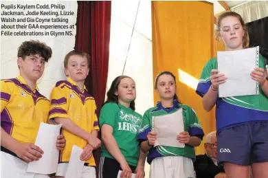  ??  ?? Pupils Kaylem Codd, Philip Jackman, Jodie Keeling, Lizzie Walsh and Gia Coyne talking about their GAA experience­s at Féile celebratio­ns in Glynn NS.