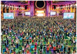  ??  ?? Phenomenon: Adriene’s yoga class at London’s Alexandra Palace