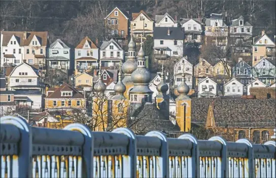  ?? Andrew Rush/Post-Gazette ?? McKees Rocks can be seen from the McKees Rocks Bridge. The small borough’s population peaked in the 1930s at 18,000 and now stands at about 6,000,