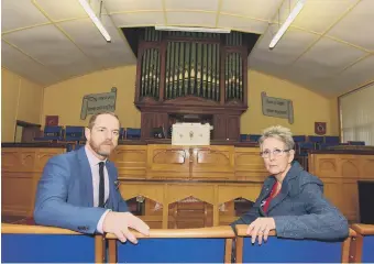  ??  ?? Funeral director Glen Miller, who is fundraisin­g for the Independen­t Methodist Church, Boldon Colliery, with church treasurer Iris Ogilvie.