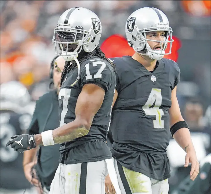  ?? Abbie Parr
The Associated Press ?? Raiders wide receiver Davante Adams and quarterbac­k Derek Carr have not made the kind of connection this season that was expected of the former college teammates.