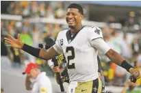  ?? PHELAN M. EBENHACK/ASSOCIATED PRESS ?? Saints quarterbac­k Jameis Winston celebrates after New Orleans’ victory over the Packers on Sunday in Jacksonvil­le, Fla.