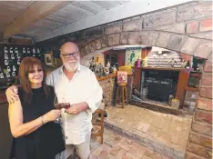  ??  ?? Terry and Sandra Reidy, pictured in the cellar, are selling their circa 1854 house in Highton