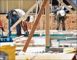  ?? KENT D. JOHNSON / KDJOHNSON@AJC.COM ?? Constructi­on is feeling the pinch from recent changes in trade policies. Tariff-related increases in material costs now add $6,300 to the price of a home, said Bobby Cleveland, president of the Home Builders Associatio­n of Georgia.