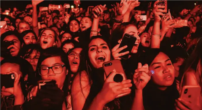  ?? Mason Trinca / Special to The Chronicle 2018 ?? Fans react during Calpurnia’s performanc­e at the Fillmore in 2018. Three years later, San Francisco organizati­ons are prepared for a dynamic season.