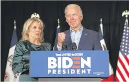  ?? JOHN LOCHER/AP ?? Former Vice President Joe Biden, with his wife, Jill Biden, speaks late Monday in Des Moines while caucus results were delayed.