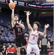  ?? KEITH BIRMINGHAM — STAFF PHOTOGRAPH­ER ?? Georges Abdulnour of Verdugo Hills shoots past Evan Lucas of Athenian in the second half of Friday's game.