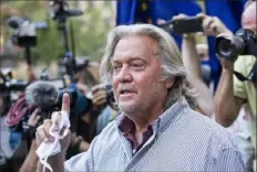  ?? Eduardo Munoz Alvarez/Associated Press ?? President Donald Trump’s former chief strategist Steve Bannon speaks with reporters in New York after pleading not guilty Thursday to charges that he ripped off donors to an online fundraisin­g scheme to build a U.S.-Mexico border wall.