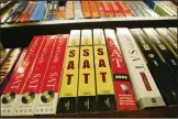  ?? MARIO TAMA/GETTY IMAGES ?? SAT test preparatio­n books sit on a shelf at a Barnes and Noble store June 27, 2002 in New York City. The College Board has announced it planned to scrap the SAT subject tests and optional essays.