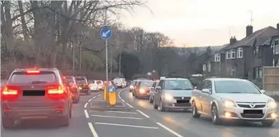  ??  ?? Lengthy delays are being caused on Chester Road, Macclesfie­ld