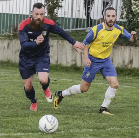  ??  ?? Glen McCormack of Glenview Stars in action with St Bernard’s Paddy Mullens on Sunday. Pic: Donal Hackett.