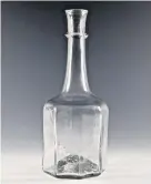  ??  ?? Above: A straight-sided mallet decanter with single string rim dating from around 1730; Early serving bottle in shaft and globe style from around 1750