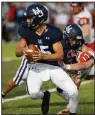  ?? NWA Democrat-Gazette/ANDY SHUPE ?? Springdale Har-Ber’s Blaise
Wittschen (15) was 19-of-32 passing for 322 yards and 3 TDs against Russellvil­le.