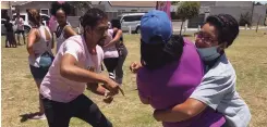  ??  ?? WOMEN and children from Silversand­s in Blue Downs receive free self-defence lessons.