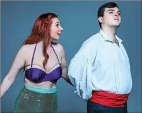  ?? PHOTOS BY JOHN DAGGETT ?? Amanda Morrell, left, stars as Ariel and John DiFerdinan­do as Prince Eric in Steel River Playhouse’s “The Little Mermaid.”