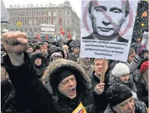  ?? AFP/OLGA MALTSEVA
LEHTIKUVA/ ?? VALMANIFES­T. Vladimir Putin kallar opposition­en populister och varnar väljarna för deras sirensång.
