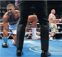  ?? Picture: REUTERS/ ANDREW COULDRIDGE ?? MASSIVE SETBACK: Anthony Joshua is knocked down by Andy Ruiz at Madison Square Garden in New York on Saturday in the seventh round of their bout.