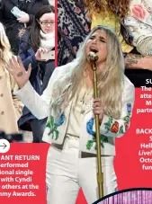  ??  ?? A TRIUMPHANT RETURN Kesha performed her emotional single ‘Praying’ with Cyndi Lauper and others at the 2018 Grammy Awards.