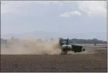  ?? BAY AREA NEWS GROUP FILE PHOTO ?? A tractor tills a field in the Central Valley, where water issues remain a crucial topic for farmers.