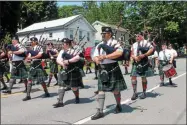  ?? LAUREN HALLIGAN - MEDIANEWS GROUP FILE ?? A bagpipe band marches in the 2018 Turning Point Parade in Schuylervi­lle.