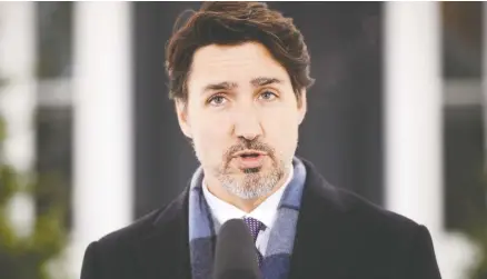  ?? SEAN KILPATRICK / THE CANADIAN PRESS ?? Prime Minister Justin Trudeau addresses Canadians on the COVID-19 situation from his isolation at Rideau Cottage in Ottawa on Tuesday.